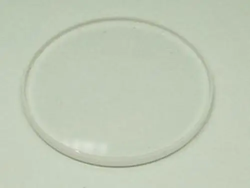 Klares, runde Schauglas von Remeha, ohne erkennbare Maße. Das Glas weist eine glatte Oberfläche auf und ist für die Beobachtung innerhalb von Geräten geeignet.